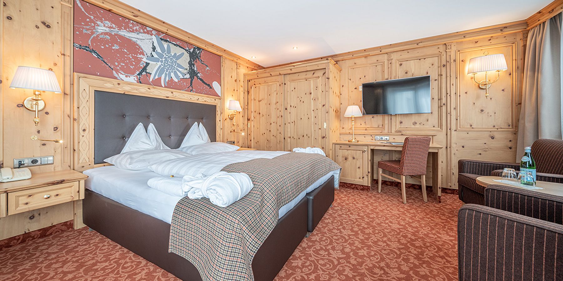 Gemütliches Doppelzimmer im Hotel Edelweiss, Ötztal - Ihr komfortabler Rückzugsort für einen perfekten Winterurlaub.